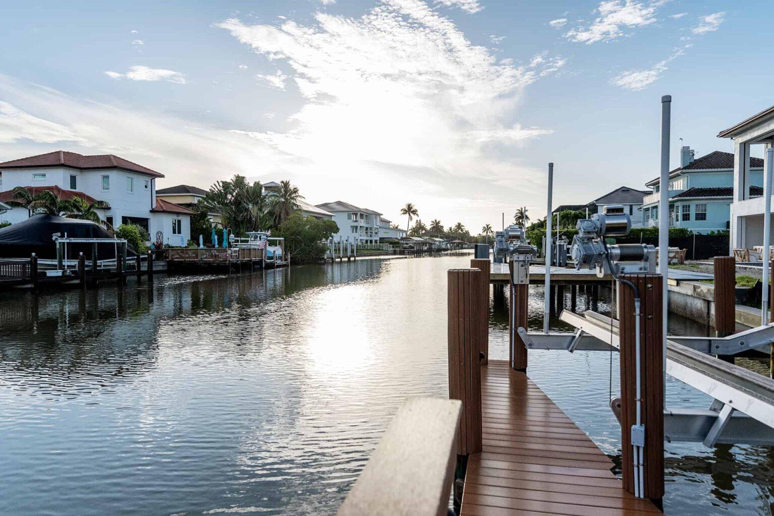 naples fl vacation home Private Boat Dock. Can accommodate One 36' vessel or 2 jet skis. Has electric lift. looking down canal